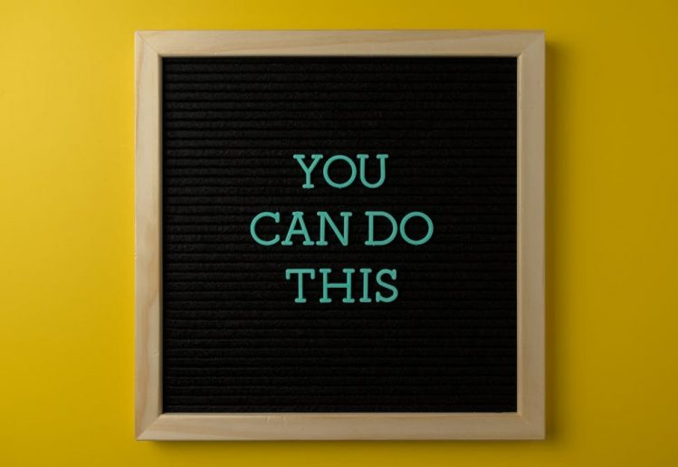 Inspirational message 'You Can Do This' displayed on a blackboard with a bold yellow backdrop.